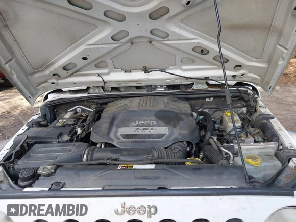 2012 Jeep Wrangler Sport with VIN 1C4AJWAG7CL192200, listed as a IAAI auction lot 42472398 with 198,999 mi miles and . Bid and sale history available at DreamBid. Image 10.