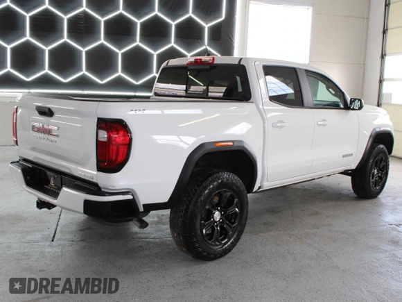 2024 GMC Canyon 4WD Elevation with VIN 1GTP6BEK1R1223920, listed as a Copart auction lot 54775455 with 18,284 mi miles and Salvage Title. Bid and sale history available at carsss.com. Image 3.