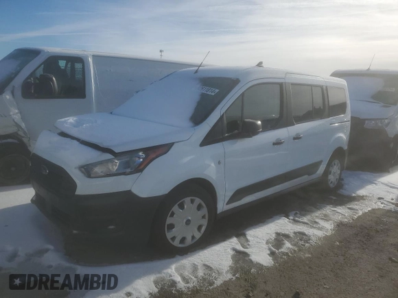2022 Ford Transit Connect XL with VIN NM0GE9E23N1514695, listed as a Copart auction lot 82611814 with 84,124 mi miles and Salvage title. Bid and sale history available at DreamBid. Image 2.