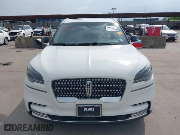 2020 Lincoln Aviator Reserve with VIN 5LM5J7WC1LGL28593, listed as a IAAI auction lot 42137327 with 83,114 mi miles and . Bid and sale history available at DreamBid. Image 12.