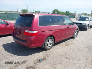2006 Honda Odyssey EX with VIN 5FNRL38456B113072, listed as a IAAI auction lot 42112693 with 238,883 mi miles. Bid and sale history available at carsss.com. Image 4.