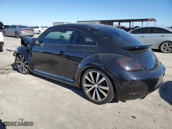 2012 Volkswagen Beetle 2.0T Turbo with VIN 3VW467AT8CM642823, listed as a Copart auction lot 85107614 with 42,315 mi miles and Salvage Title. Bid and sale history available at carsss.com. Image 2.