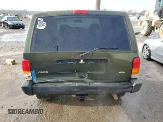 1997 Jeep Cherokee SE with VIN 1J4FJ28S5VL551419, listed as a Copart auction lot 42241185 with 239,699 mi miles and Salvage Title. Bid and sale history available at carsss.com. Image 6.