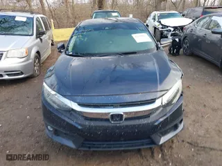 2016 Honda Civic Sedan Touring with VIN 19XFC1F97GE011768, listed as a IAAI auction lot 41208852 with 132,268 mi miles. Bid and sale history available at carsss.com. Image 12.