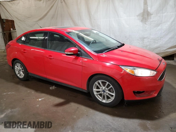 2015 Ford Focus SE with VIN 1FADP3F20FL205273, listed as a Copart auction lot 58627814 with 198,266 mi miles and Salvage title. Bid and sale history available at DreamBid. Image 4.