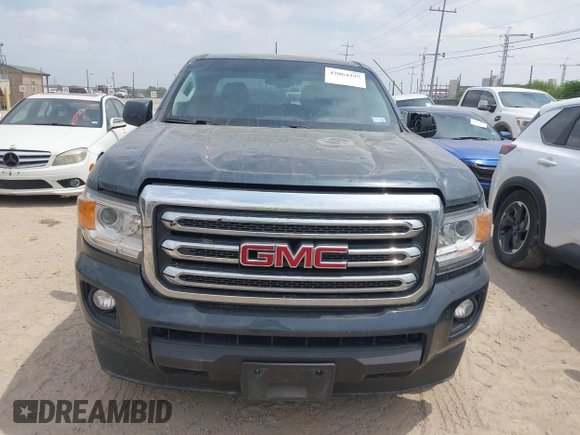 2019 GMC Canyon 4WD SLE z VIN 1GTG6CENXK1261278, wystawiony jako IAAI lot #42064295 z przebiegiem 51 786 mil mil oraz . Historia ofert i sprzedaży dostępna na DreamBid. Obrazek 12.