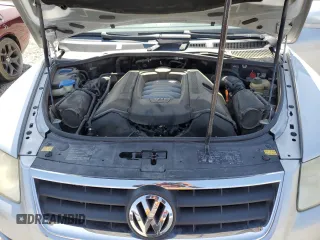 2005 Volkswagen Touareg z VIN WVGCM77L95D014940, wystawiony jako Copart lot #60156795 z przebiegiem 114 551 mil mil oraz Czysty tytuł • Clean title. Historia ofert i sprzedaży dostępna na DreamBid. Obrazek 12.