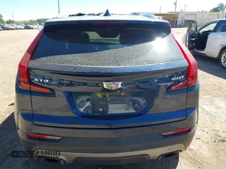 2019 Cadillac XT4 FWD Premium Luxury z VIN 1GYFZCR47KF109394, wystawiony jako IAAI lot #41864606 z przebiegiem 98 425 mil mil oraz . Historia ofert i sprzedaży dostępna na DreamBid. Obrazek 16.