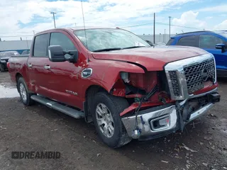 2017 Nissan Titan SV with VIN 1N6AA1E66HN563991, listed as a IAAI auction lot 42639581 with 183,449 mi miles and . Bid and sale history available at DreamBid. Image 1.