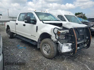2018 Ford F-350 XL with VIN 1FT8W3BT3JEC37855, listed as a Copart auction lot 63740775 with 128,675 mi miles and Salvage title. Bid and sale history available at DreamBid. Image 4.