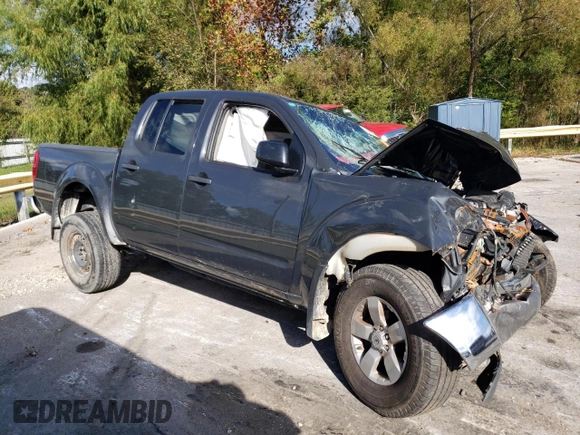 2010 Nissan Frontier Pro-4X with VIN 1N6AD0EVXAC414638, listed as a Copart auction lot 72902794 with Not provided miles and Salvage title. Bid and sale history available at DreamBid. Image 4.
