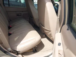 2001 Ford Explorer XLT z VIN 1FMZU73E71ZA79770, wystawiony jako IAAI lot #42499921 z przebiegiem 174 050 mil mil oraz . Historia ofert i sprzedaży dostępna na DreamBid. Obrazek 8.