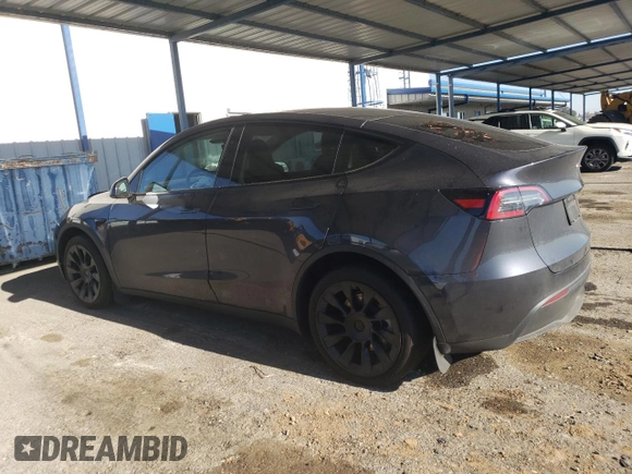 2024 Tesla Model Y Long Range with VIN 7SAYGDEE4RF127409, listed as a Copart auction lot 84274794 with 14,246 mi miles and Salvage title. Bid and sale history available at DreamBid. Image 2.