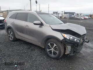2017 Kia Sorento EX with VIN 5XYPHDA50HG309241, listed as a IAAI auction lot 41799412 with 104,890 mi miles and . Bid and sale history available at DreamBid. Image 1.