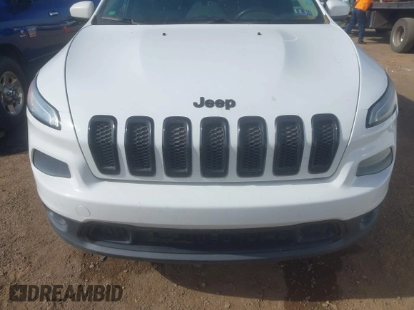 2014 Jeep Cherokee Latitude with VIN 1C4PJMCS7EW298115, listed as a IAAI auction lot 41605052 with 184,773 mi miles and . Bid and sale history available at DreamBid. Image 6.