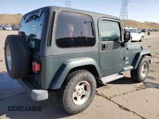 2003 Jeep Wrangler Sahara z VIN 1J4FA59SX3P302622, wystawiony jako Copart lot #52756105 z przebiegiem 181 900 mil mil oraz Szkoda całkowita • Salvage title. Historia ofert i sprzedaży dostępna na DreamBid. Obrazek 3.