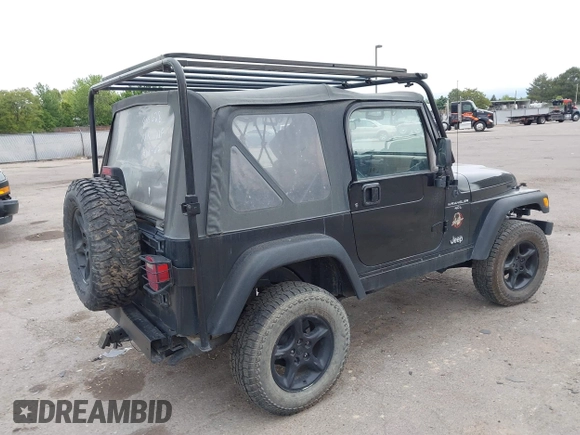 2000 Jeep Wrangler Sahara with VIN 1J4FA59S7YP805628, listed as a IAAI auction lot 42259201 with Not provided miles and . Bid and sale history available at DreamBid. Image 4.