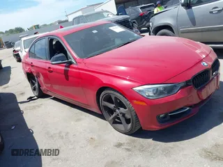 2012 BMW 3 Series 328i with VIN WBA3A5C57CFJ89565, listed as a IAAI auction lot 39130127 with 76,917 mi miles. Bid and sale history available at carsss.com. Image 1.