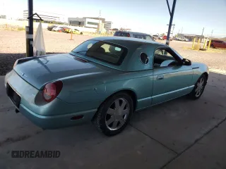 2002 Ford Thunderbird Hardtop Premium z VIN 1FAHP60A22Y109399, wystawiony jako Copart lot #61760324 z przebiegiem 137 158 mil mil oraz Szkoda całkowita • Salvage title. Historia ofert i sprzedaży dostępna na DreamBid. Obrazek 3.