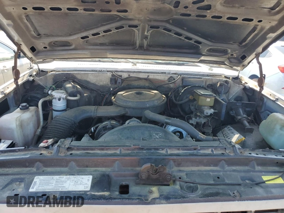 1990 Chevrolet Blazer z VIN 1GNEV18K5LF144221, wystawiony jako Copart lot #52296175 z przebiegiem 114 593 mil mil oraz Szkoda całkowita • Salvage title. Historia ofert i sprzedaży dostępna na DreamBid. Obrazek 12.