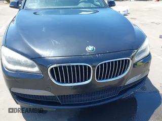 2015 BMW 7 Series 740Li z VIN WBAYE4C50FD138977, wystawiony jako IAAI lot #42277341 z przebiegiem 109 877 mil mil oraz . Historia ofert i sprzedaży dostępna na DreamBid. Obrazek 6.