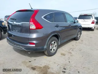 2015 Honda CR-V LX with VIN 3CZRM3H32FG702573, listed as a IAAI auction lot 41824116 with 266,847 mi miles. Bid and sale history available at carsss.com. Image 4.