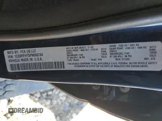 2023 Ram 1500 Limited with VIN 1C6SRFHT5PN666744, listed as a Copart auction lot 48538235 with 54,446 mi miles and Salvage title. Bid and sale history available at DreamBid. Image 12.