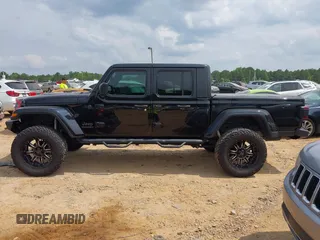 2021 Jeep Gladiator Willys with VIN 1C6HJTAG7ML514114, listed as a IAAI auction lot 42399793 with 78,829 mi miles and . Bid and sale history available at DreamBid. Image 14.