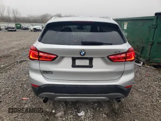 2018 BMW X1 xDrive28i with VIN WBXHT3C36J5F90135, listed as a Copart auction lot 43766955 with 76,530 mi miles and Salvage Title. Bid and sale history available at carsss.com. Image 6.