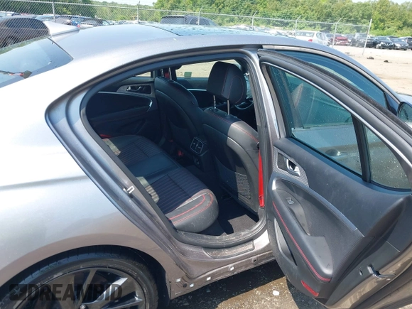 2023 Genesis G70 2.0T with VIN KMTG34TA2PU121151, listed as a IAAI auction lot 42425161 with 19,646 mi miles and . Bid and sale history available at DreamBid. Image 8.