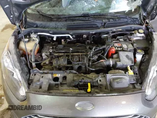 2014 Ford Fiesta SE with VIN 3FADP4BJ9EM117175, listed as a IAAI auction lot 41737432 with 156,141 mi miles. Bid and sale history available at carsss.com. Image 10.
