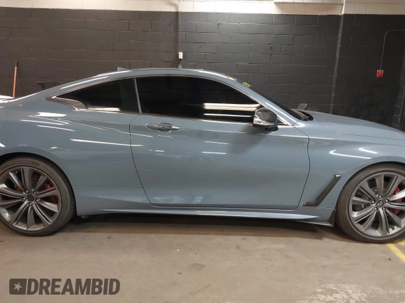 2022 Infiniti Q60 Red Sport 400 with VIN JN1FV7LL4NM681132, listed as a IAAI auction lot 40733343 with 14,309 mi miles and . Bid and sale history available at DreamBid. Image 13.