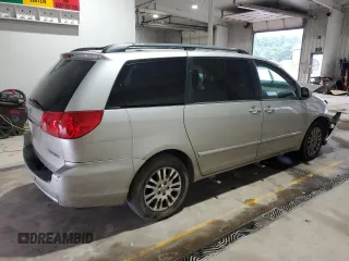 2010 Toyota Sienna XLE с VIN 5TDYK4CC9AS342961, выставлен на аукционе Copart как лот 60057105 с пробегом Не указан миль и Списание • Salvage title. История ставок и продаж доступна на DreamBid. Изображение 3.