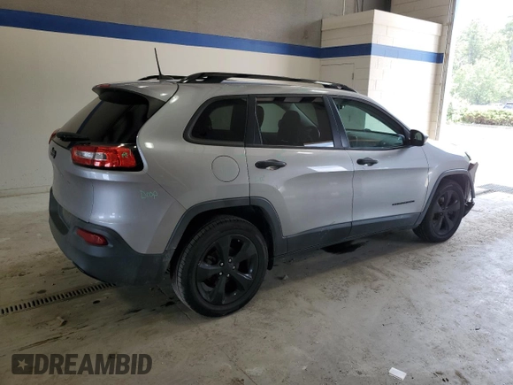 2017 Jeep Cherokee Altitude with VIN 1C4PJLABXHW586048, listed as a Copart auction lot 62674745 with 106,334 mi miles and Salvage title. Bid and sale history available at DreamBid. Image 3.