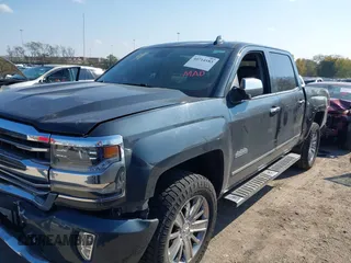 2018 Chevrolet Silverado 1500 High Country with VIN 3GCUKTEC8JG308353, listed as a IAAI auction lot 40714183 with 88,711 mi miles and . Bid and sale history available at DreamBid. Image 17.
