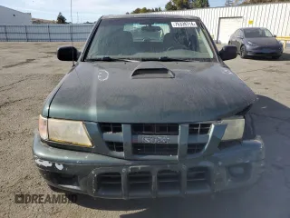 2004 Isuzu Rodeo S with VIN 4S2CK58W344303242, listed as a Copart auction lot 75339714 with 106,659 mi miles and Salvage title. Bid and sale history available at DreamBid. Image 5.