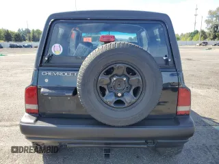 1998 Chevrolet Tracker z VIN 2CNBJ1868W6925819, wystawiony jako Copart lot #70881874 z przebiegiem 180 849 mil mil oraz Szkoda całkowita • Salvage title. Historia ofert i sprzedaży dostępna na DreamBid. Obrazek 6.