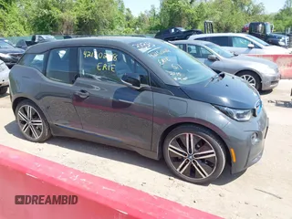 2015 BMW i3 z VIN WBY1Z4C59FV504579, wystawiony jako IAAI lot #42150268 z przebiegiem 42 722 mil mil oraz . Historia ofert i sprzedaży dostępna na DreamBid. Obrazek 1.