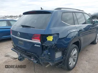 2021 Volkswagen Atlas SE z VIN 1V2JR2CA3MC555490, wystawiony jako IAAI lot #41286240 z przebiegiem 89 435 mil mil oraz . Historia ofert i sprzedaży dostępna na DreamBid. Obrazek 6.