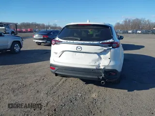 2016 Mazda CX-9 Touring with VIN JM3TCBCY5G0122551, listed as a IAAI auction lot 41613683 with 137,474 mi miles. Bid and sale history available at carsss.com. Image 16.