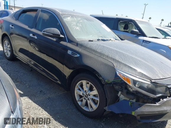 2017 Kia Optima LX z VIN KNAGT4L33H5156094, wystawiony jako IAAI lot #42405505 z przebiegiem 111 622 mil mil oraz . Historia ofert i sprzedaży dostępna na DreamBid. Obrazek 1.