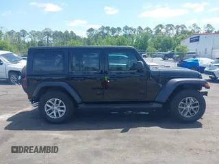 2023 Jeep Wrangler Sport S with VIN 1C4HJXDN5PW671167, listed as a IAAI auction lot 42176127 with 1,230 mi miles and . Bid and sale history available at DreamBid. Image 14.