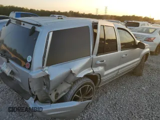 2004 Jeep Grand Cherokee with VIN 1J8GX58J54C284761, listed as a Copart auction lot 75614854 with 182,188 mi miles and Salvage title. Bid and sale history available at DreamBid. Image 3.