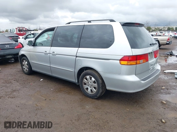 2003 Honda Odyssey EX-L z VIN 5FNRL18033B096575, wystawiony jako IAAI lot #41576926 z przebiegiem 210 932 mil mil oraz . Historia ofert i sprzedaży dostępna na DreamBid. Obrazek 3.