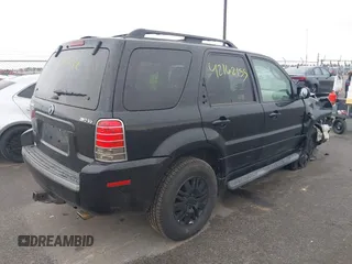 2005 Mercury Mariner Luxury z VIN 4M2CU57115DJ33938, wystawiony jako IAAI lot #42162155 z przebiegiem 174 834 mil mil oraz . Historia ofert i sprzedaży dostępna na DreamBid. Obrazek 4.