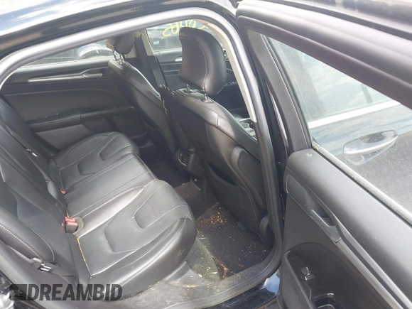 2016 Ford Fusion Titanium with VIN 3FA6P0K97GR135106, listed as a IAAI auction lot 42269165 with 155,036 mi miles and . Bid and sale history available at DreamBid. Image 8.
