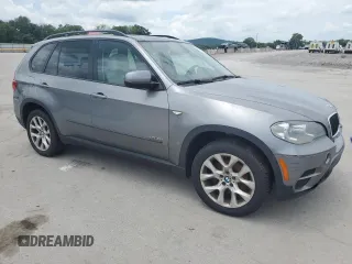 2012 BMW X5 35i with VIN 5UXZV4C59CL991689, listed as a Copart auction lot 64022615 with 208,620 mi miles and Salvage title. Bid and sale history available at DreamBid. Image 4.