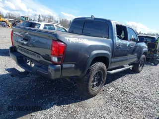 2019 Toyota Tacoma SR z VIN 3TMCZ5AN9KM232882, wystawiony jako IAAI lot #41879314 z przebiegiem Nie podano mil oraz . Historia ofert i sprzedaży dostępna na DreamBid. Obrazek 4.