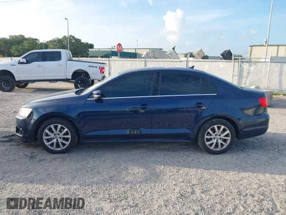 2014 Volkswagen Jetta SE with VIN 3VWD07AJ6EM417996, listed as a IAAI auction lot 42723125 with 108,952 mi miles and . Bid and sale history available at DreamBid. Image 14.
