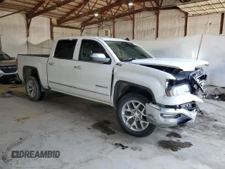 2018 GMC Sierra 1500 SLT z VIN 3GTU2NEC3JG279324, wystawiony jako Copart lot #52692245 z przebiegiem 112 974 mil mil oraz Szkoda całkowita • Salvage title. Historia ofert i sprzedaży dostępna na DreamBid. Obrazek 4.